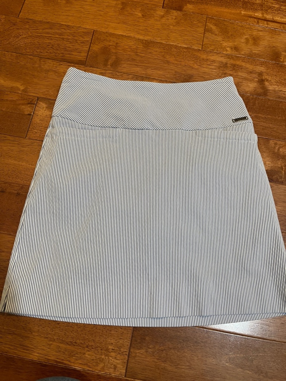 Striped active skort from SC & Co featuring tummy control. XS